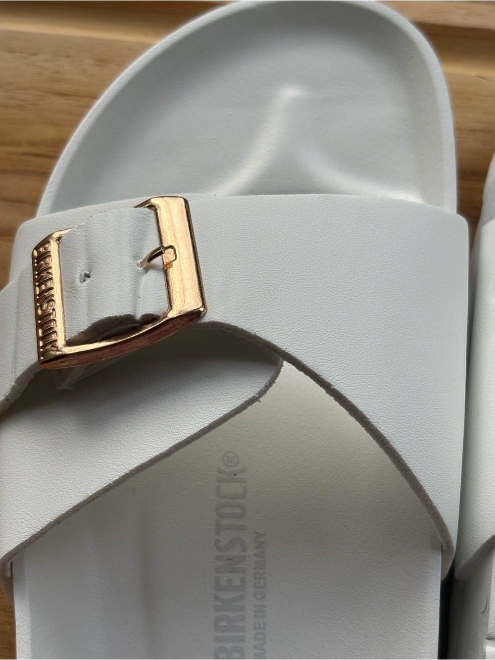 White Birkenstock Madrid Big Buckle EVA sandals with gold-toned buckles. - Picture 7 of 9